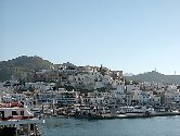 Naxos. View of Chora Naxos - Chora Naxos is the capital and biggest town on the island of Naxos.                    Naxos, Naxos hotels, Naxos rooms, naxos apartments, naxos studios, naxos accommodation, hotels in naxos, apartments in naxos. Naxos island, Cyclades, Greece. Tourist and Business Guide of Naxos. Travel to Naxos. Visit Naxos. Holidays in Naxos.