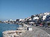 Naxos. View of the main road on Chora Naxos, also known as Paralia.                   Naxos, Naxos hotels, Naxos rooms, naxos apartments, naxos studios, naxos accommodation, hotels in naxos, apartments in naxos. Naxos island, Cyclades, Greece. Tourist and Business Guide of Naxos. Travel to Naxos. Visit Naxos. Holidays in Naxos.